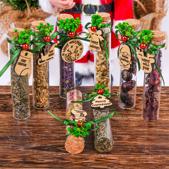 Christmas Tea Favors for Guests Gifts, Happy Holiday Favors, Tea Party Favors, Gift Exchange Items designed by Happy Times Favors, a handmade gift shop. These glass cork vials/jars are filled with 11 different tea. Ideal for Christmas, Noel, New Year, Happy Holiday party gifts, Personalized Christmas Gifts, Custom Gifts for Christmas, Christmas gifts for family, friends, coworkers, Xmas favors, Noel gifts