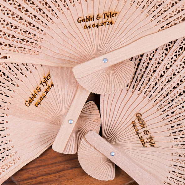 Personalized Wedding Favors: Engraved Wooden Hand Fans (Sandalwood) Items designed by Happy Times Favors, a handmade gift shop. This item is ideal for, wedding favors, unique gifts for guests, thank you gifts, bridal shower favors, baptism favors, bridesmaid favors, engagement favors, party gifts, Noel, New Year, Happy Holiday. Personalized Christmas Gifts, Custom Gifts for Christmas

