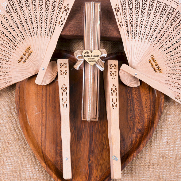 Personalized Wedding Favors: Engraved Wooden Hand Fans (Sandalwood) Items designed by Happy Times Favors, a handmade gift shop. This item is ideal for, wedding favors, unique gifts for guests, thank you gifts, bridal shower favors, baptism favors, bridesmaid favors, engagement favors, party gifts, Noel, New Year, Happy Holiday. Personalized Christmas Gifts, Custom Gifts for Christmas

