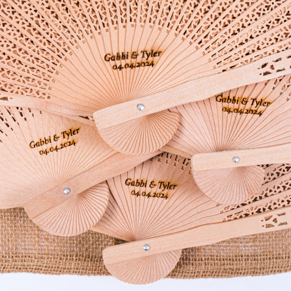 Personalized Wedding Favors: Engraved Wooden Hand Fans (Sandalwood) Items designed by Happy Times Favors, a handmade gift shop. This item is ideal for, wedding favors, unique gifts for guests, thank you gifts, bridal shower favors, baptism favors, bridesmaid favors, engagement favors, party gifts, Noel, New Year, Happy Holiday. Personalized Christmas Gifts, Custom Gifts for Christmas

